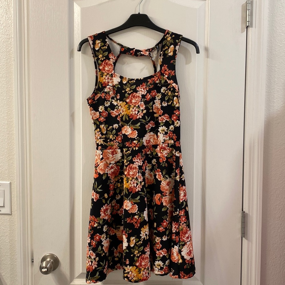 Black and floral sleeveless short dress.